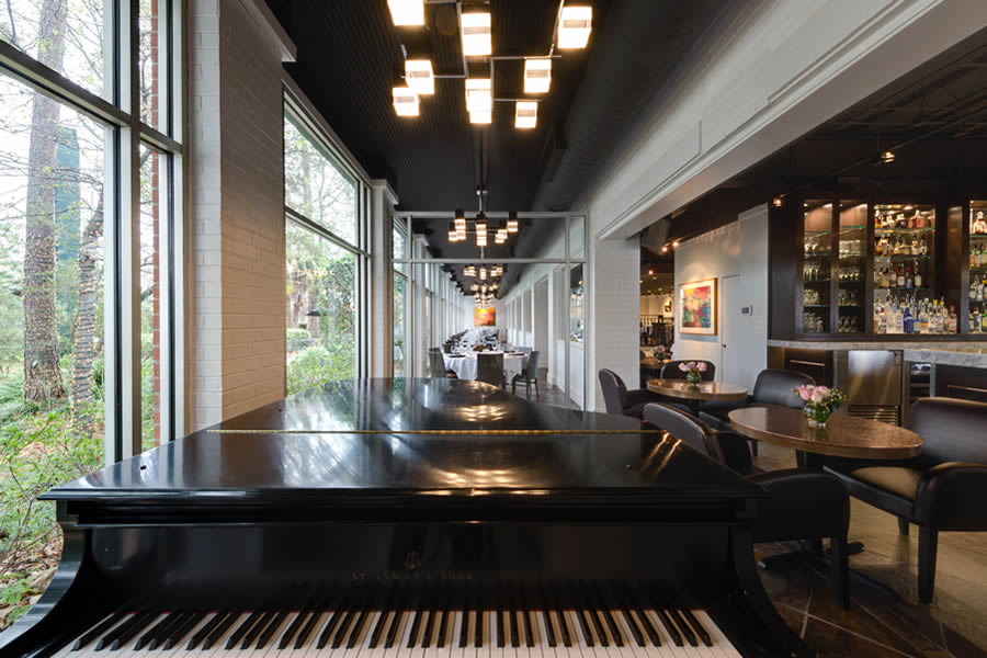 Image of the Amerigo's Grille Atrium and part of the Piano Bar from the point of view of the piano.